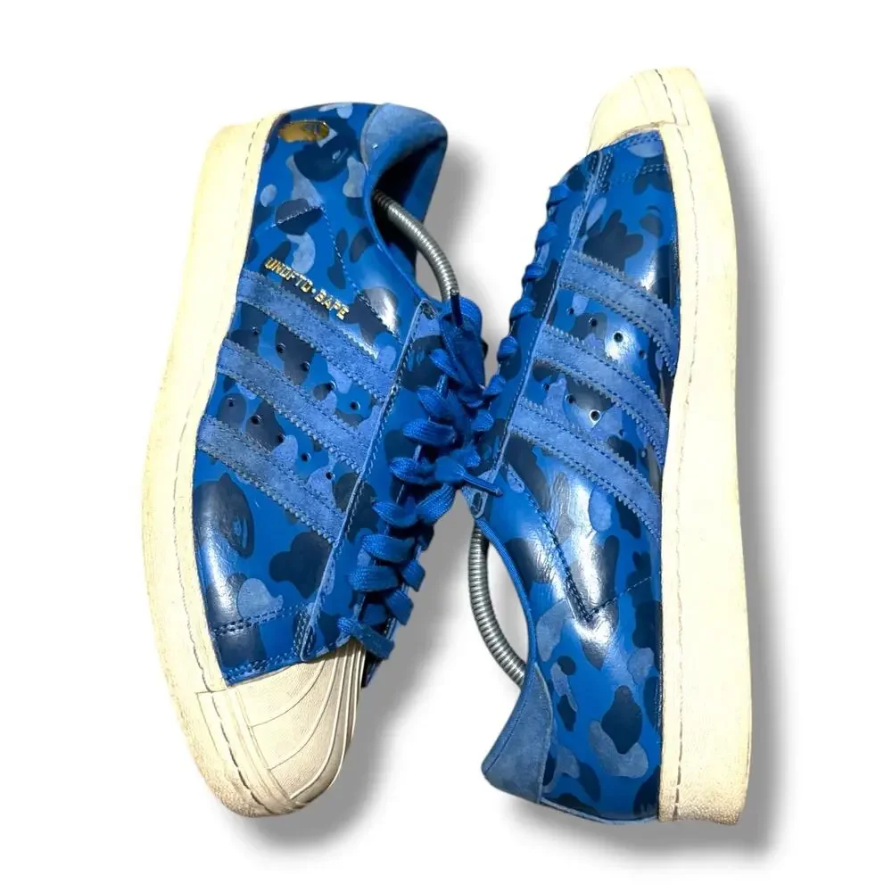 A Bathing Ape x Undefeated x adidas Superstar 80 